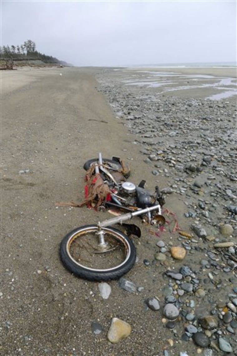 A Harley-Davidson motorbike washed ashore on Graham Island in western Canada. Japanese media say the motorcycle lost in last year's tsunami washed up on the island about 4,000 miles away. The rusted bike was originally found in a large white container where its owner, Ikuo Yokoyama, had kept it. Yokoyama, who lost three members of his family in the March 11, 2011, tsunami, was located through the license plate number.